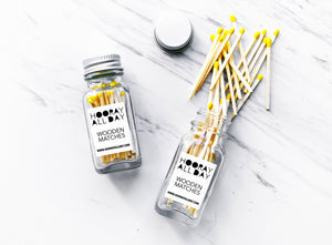 Yellow Colorful Wooden Matches In Glass Bottle