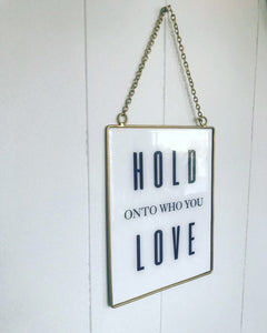 Hold onto who you love sign